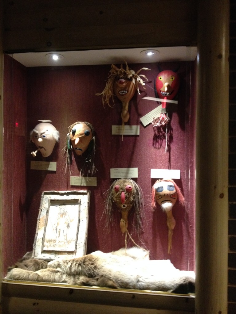 This is one of those displays of Native American art. The mask on the far left represents the first European they encountered, who just happened to be my great uncle Willie.